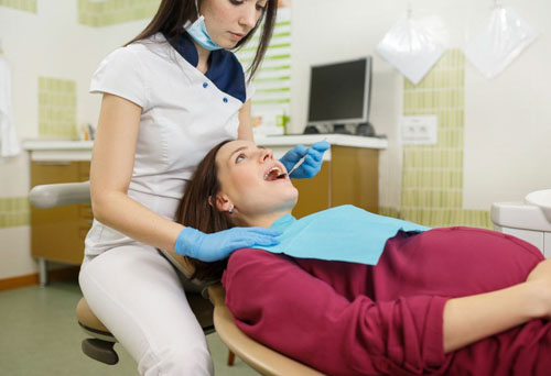 Lấy cao răng ở phụ nữ mang thai là việc làm cần thiết